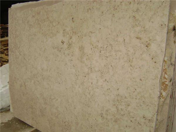 laying limestone slabs