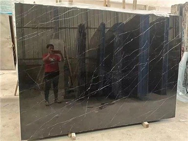 Juodo marmuro grindų tekstūra